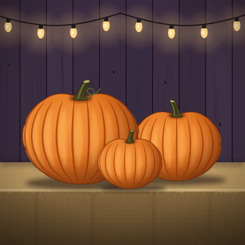 Three orange carving pumpkins on a burlap-covered stand