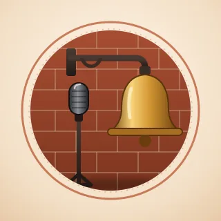 An old brass fire bell on an iron bracket, with a microphone on a stand in front of it, inside a ring