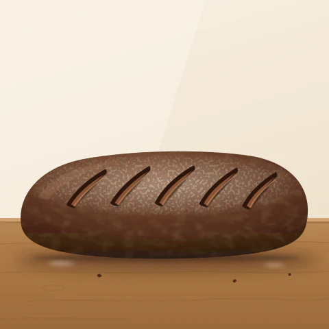 A long dark rye loaf with five diagonal cuts