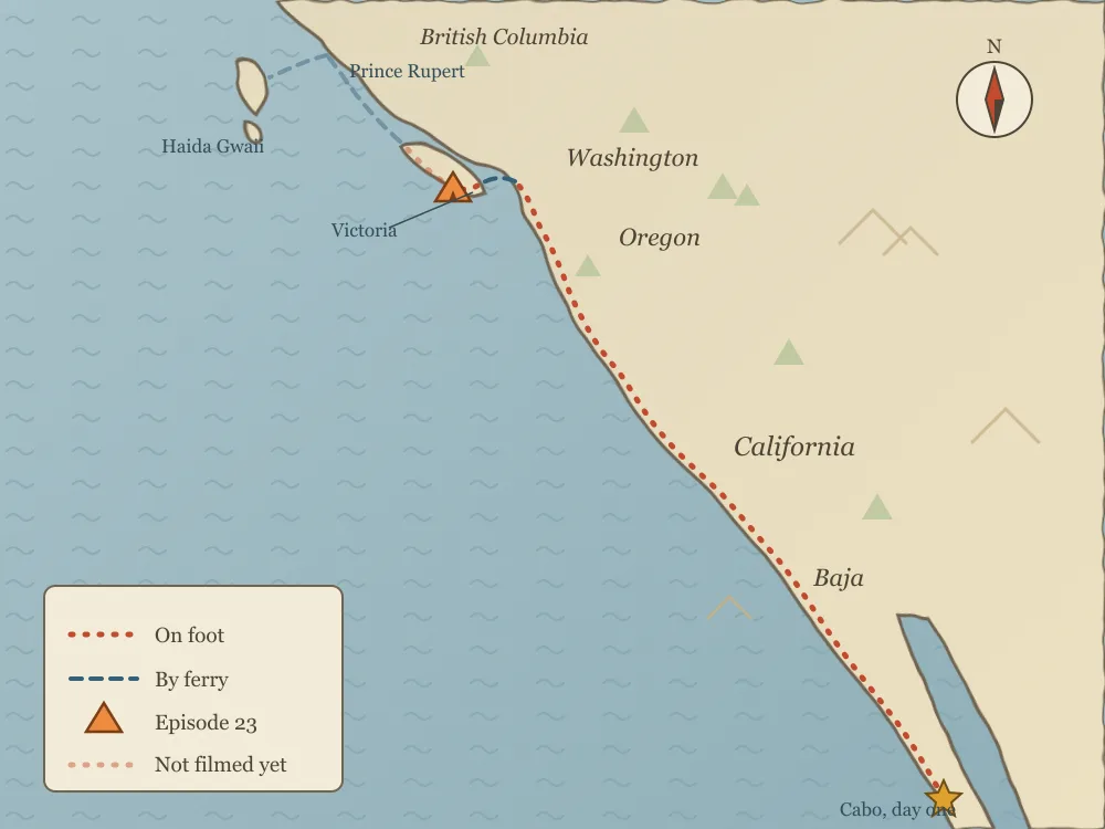 A hand-drawn map of the Pacific coast from Baja to British Columbia, the walk dotted in red from Cabo to Vancouver Island, the ferries dashed in blue, and the stretch to Prince Rupert faint because it isn’t filmed yet