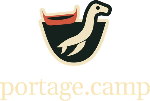 The left chest emblem: the Seen Briefly logo, with portage.camp under it
